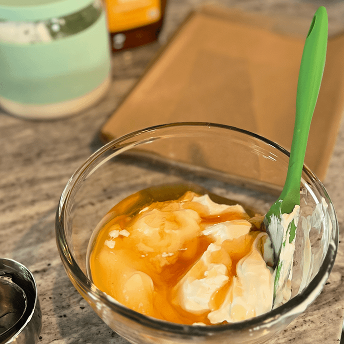Honey poured onto greek yogurt for yogurt bark recipe-2