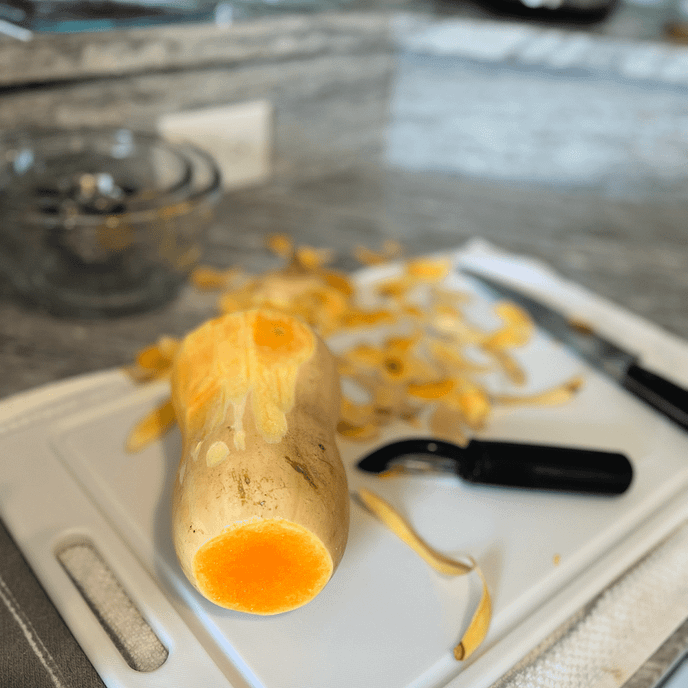 Peeling a roasted butternut squash-2
