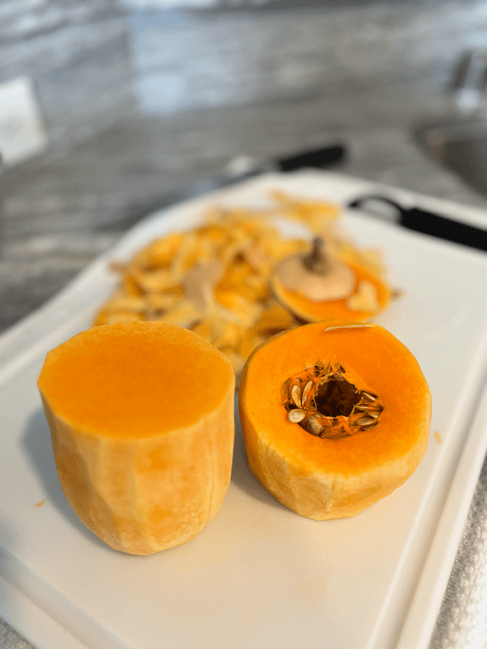 Neck cut away from round section of the butternut squash